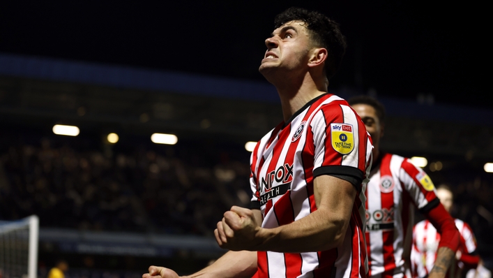 John Egan celebrates his last-gasp equaliser (Steven Paston/PA)