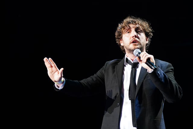 Seann Walsh performing on stage