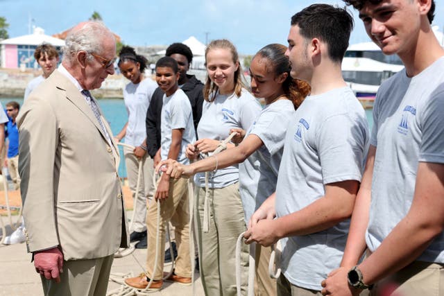 The King meets young sailors as he visits Spirit of Bermuda, a locally renowned replica tall ship