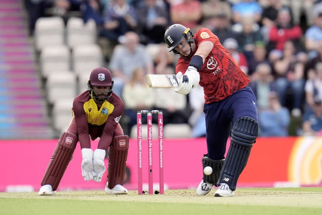 England’s Jamie Smith, right, hits over the top against the West Indies