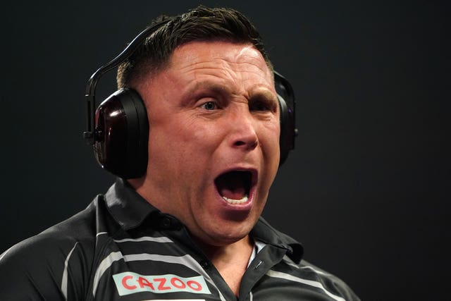 Gerwyn Price wearing ear defenders