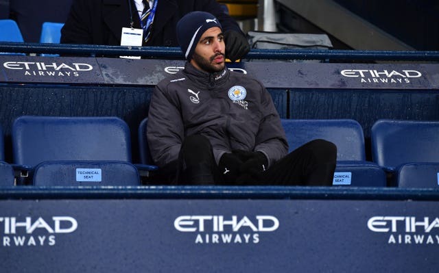 Riyad Mahrez sits alone on the Leicester bench