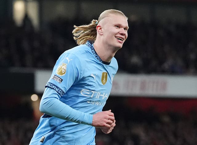 Manchester City’s Erling Haaland celebrates scoring at Arsenal