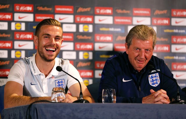 Jordan Henderson (left) and former England manager Roy Hodgson during a press conference