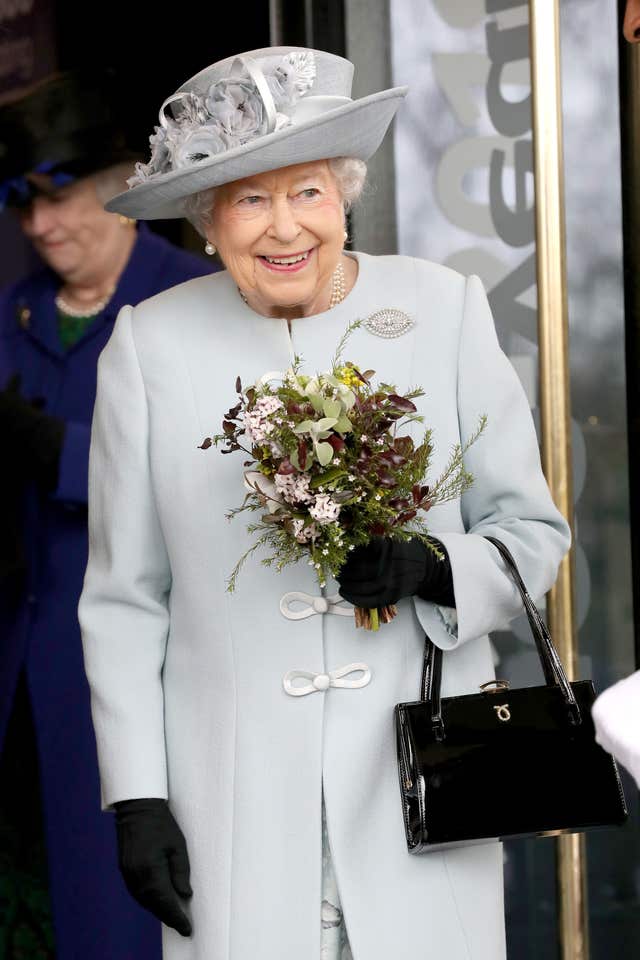 Queen Elizabeth II leaves after a visit to the Royal College of Physicians in London (Chris Jackson/PA)