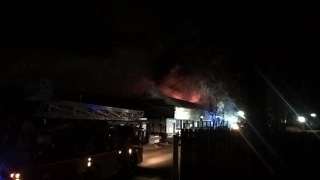 A third of the building in Northolt is alight (London Fire Brigade/PA)
