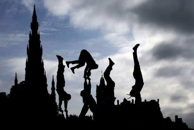 File photo dated 06/06/18 of acrobats from Cirque Berserk helping to launch the Edinburgh Festival Fringe 2018. 
