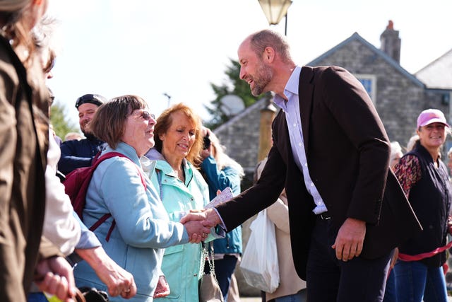 William smiles and chats to local people in Dartmoor