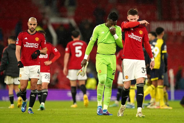 Manchester United goalkeeper Andre Onana (left) and Scott McTominay look dejected