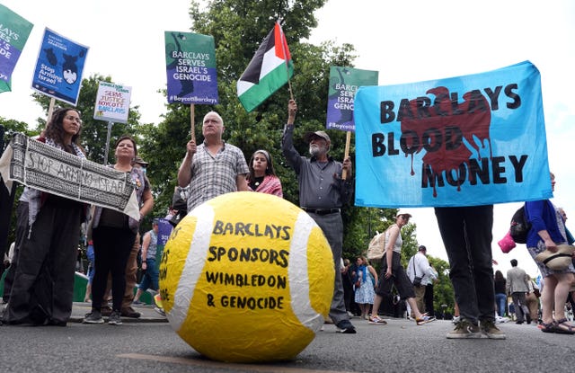 People protesting against Barclays' sponsorship of the Wimbledon Championships
