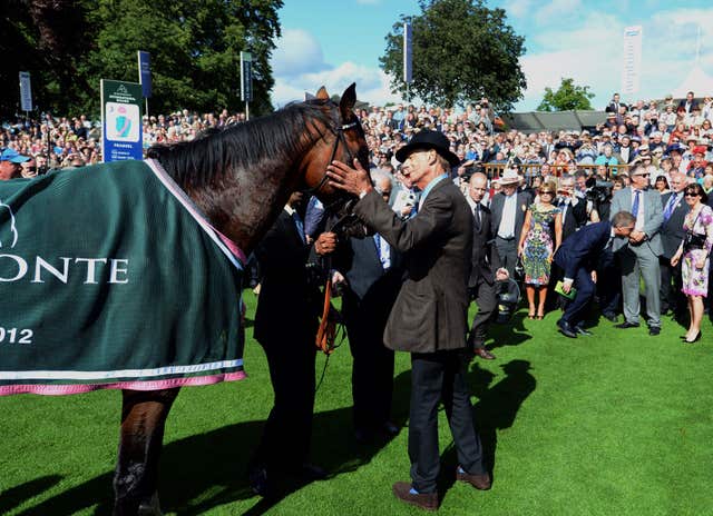 Sir Henry Cecil with Frankel following his hugely popular victory in the Juddmonte International