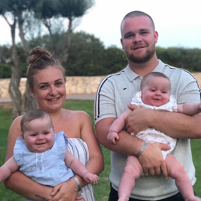 Lauren Woods and partner Jack Edwards with six-month-old daughters Mia and Grace