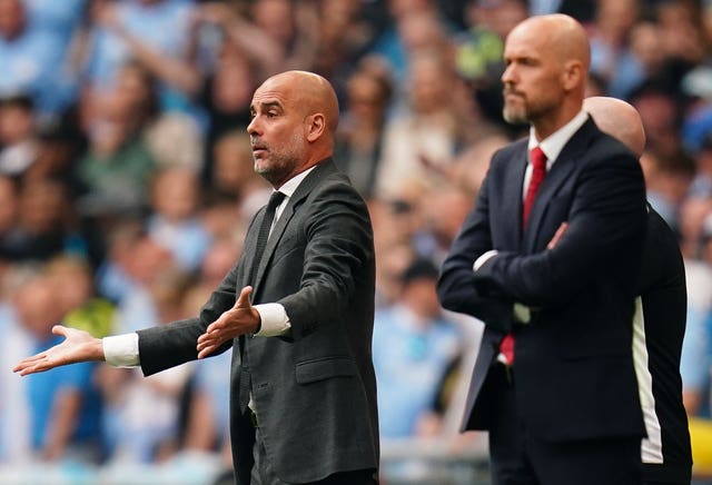 Pep Guardiola, left, and Erik ten Hag on the touchline