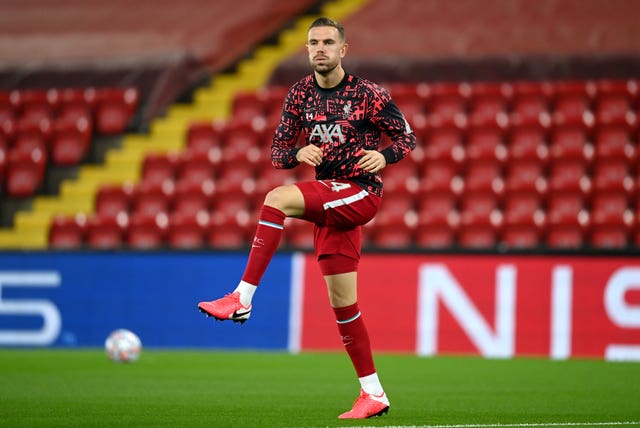 Liverpool's Jordan Henderson warming up