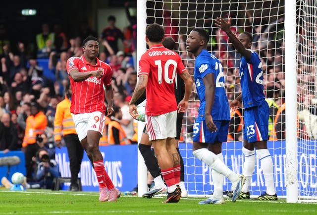 Nottingham Forest’s Taiwo Awoniyi (left) celebrates scoring their side’s third goal with team-mate Morgan Gibbs-White
