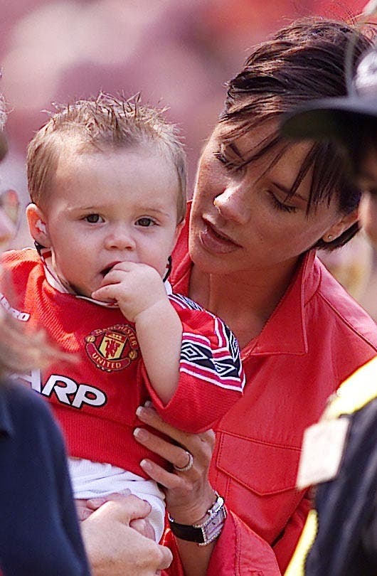 Man U v Spurs Posh Beckham & son