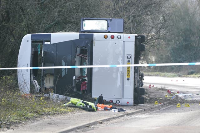 The scene on the A39 Quantock Road in Bridgwater after a double-decker bus overturned in a crash involving a motorcycle