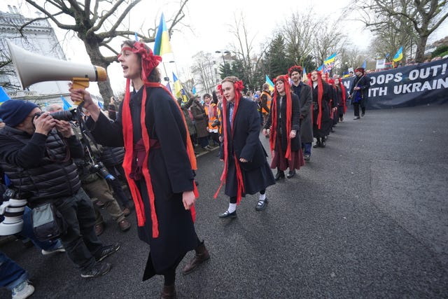 Marchers being led by Ukrainian singers from the Hromada choir