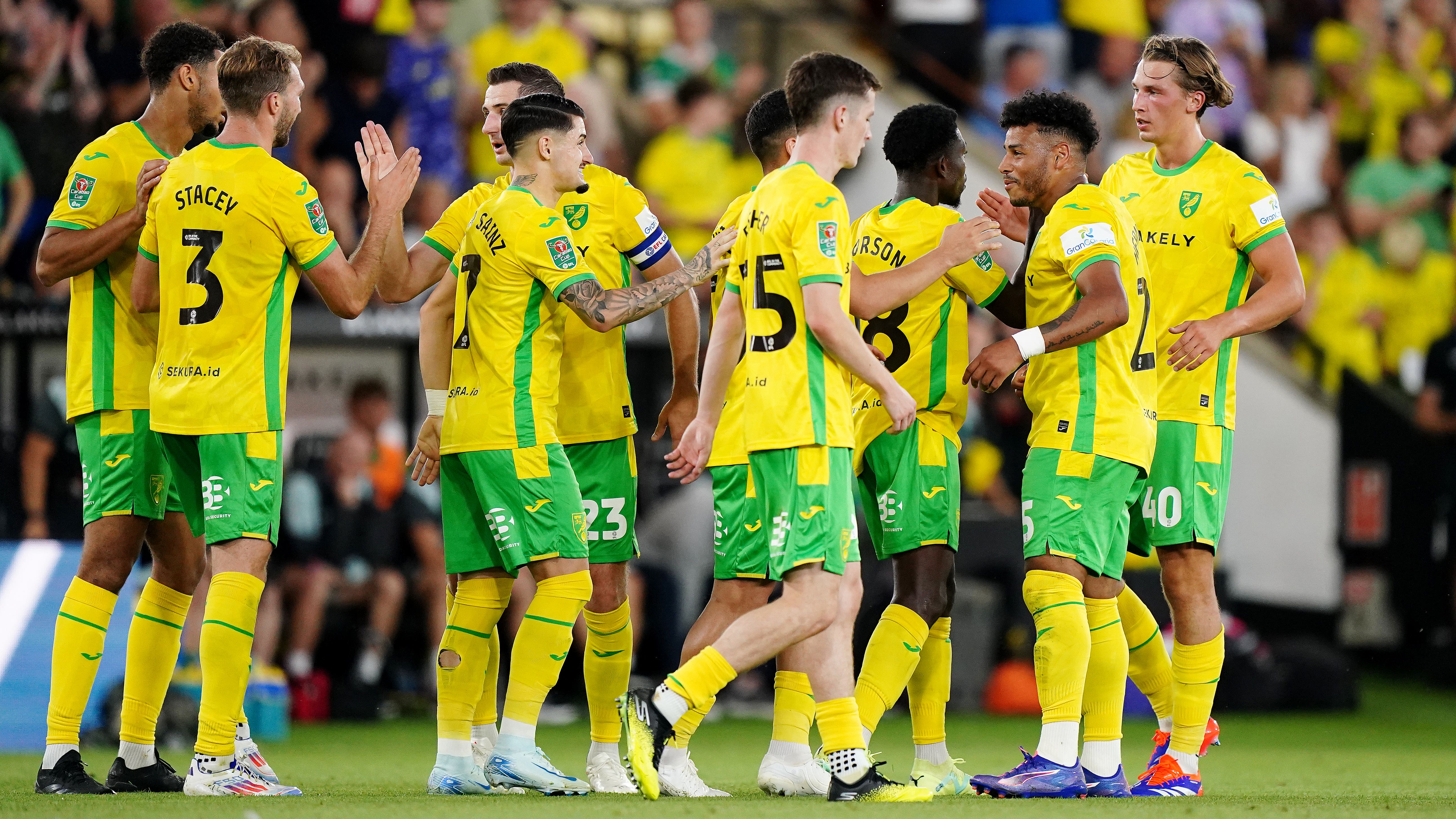 Onel Hernandez, second right, celebrates scoring for Norwich against Stevenage (Zac Goodwin/PA)