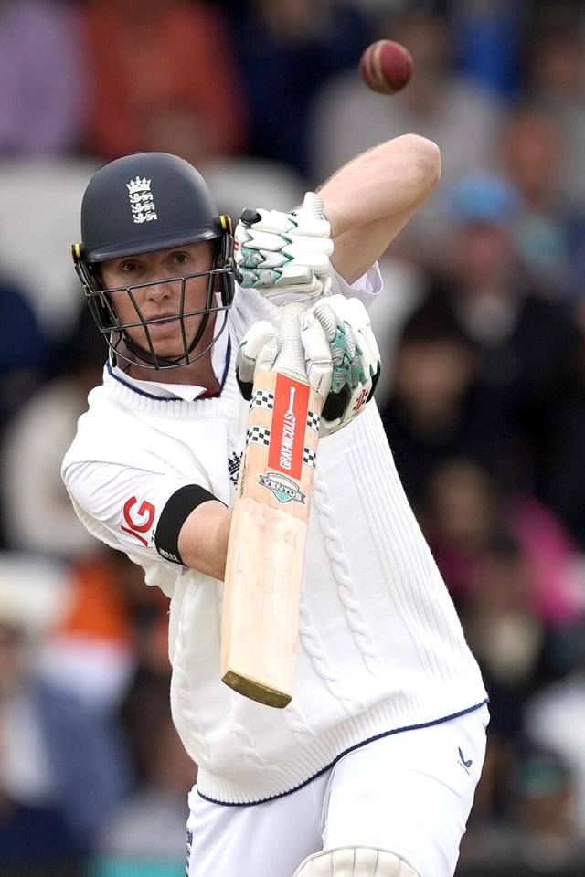 Zak Crawley drives during England's fifth day chase against India at Headingley.