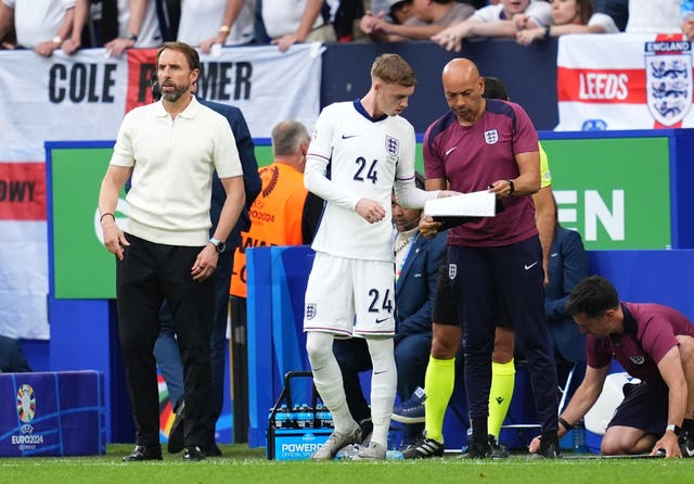 England boss Paul Nevin gives Cole Palmer instructions before he came on against Slovakia in the Euro 2024 round of 16