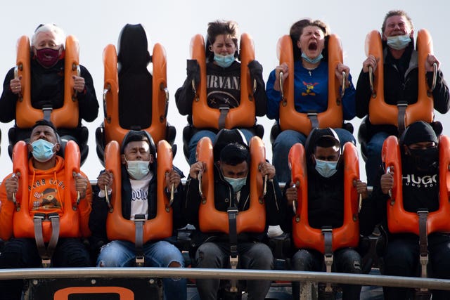 People enjoy the attractions at Alton Towers in Staffordshire (Jacob King/PA)