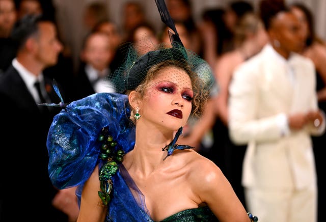 Zendaya in an elaborate dress and somewhat haughty pose at the Met Gala