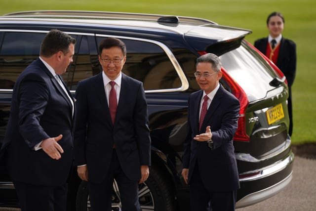 China vice president Han Zheng, centre, arriving for a reception at Buckingham Palace in May hosted by the King for overseas guests attending his coronation 