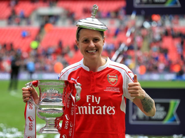 Smith celebrates with the FA Cup (Nick Potts/PA)