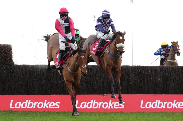 Blow Your Wad (right) jumps upsides Outlaw Peter at the last