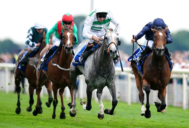 Alpinista (white cap) powers to victory in the Yorkshire Oaks