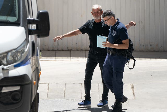 David Hunter is transported from Paphos District Court in Cyprus after he was found guilty of the manslaughter of his terminally ill wife Janice