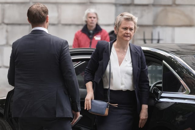 Yvette Cooper gets out of a car