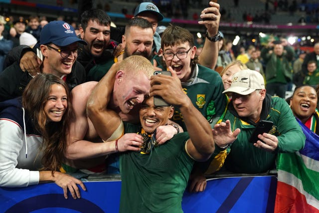 South Africa’s Damian Willemse celebrates with fans