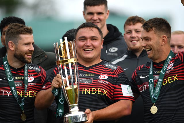 Jamie George poses with the Greene King IPA Championship trophy after Saracens made an immediate return to the Gallagher Premiership