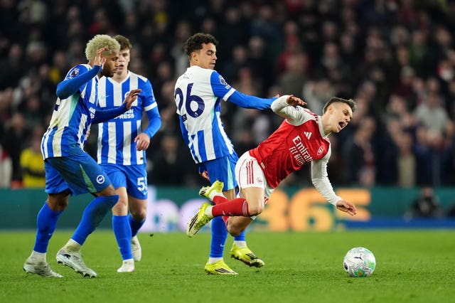 Arsenal’s Leandro Trossard (right) is challenged by Brighton and Hove Albion’s Yasin Ayari 