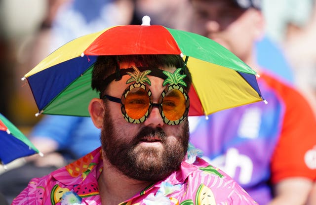 Cricket fan with sun hat