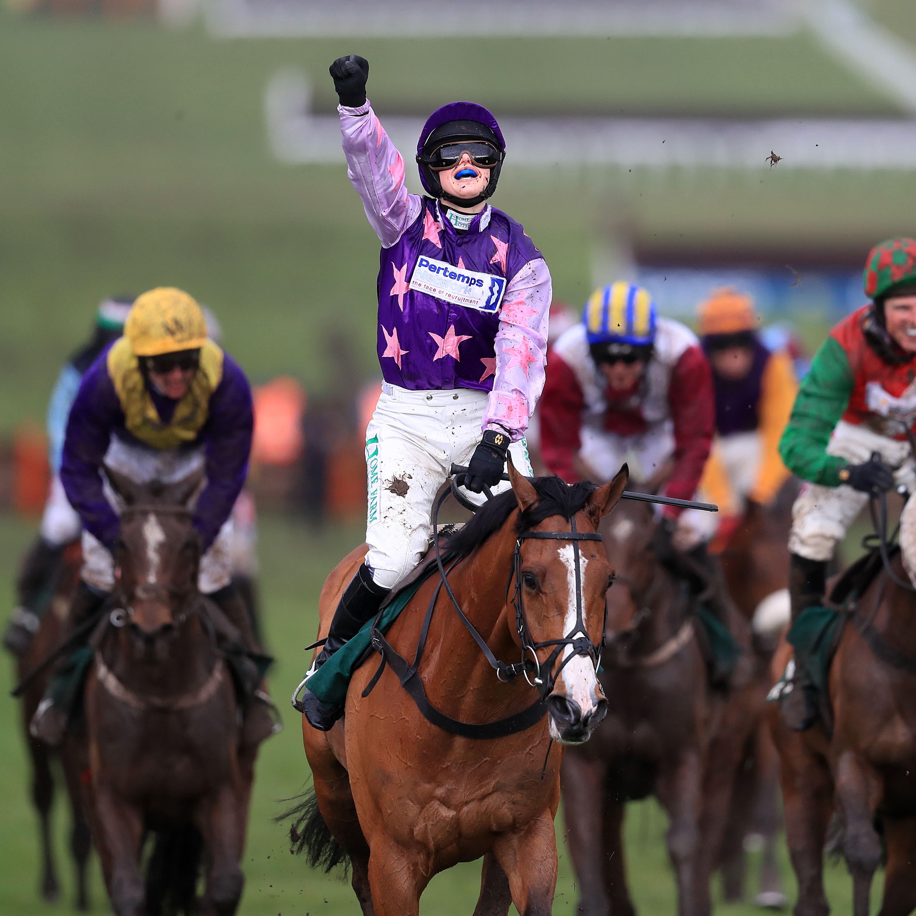 Bridget Andrews celebrates after winning the County Hurdle on Mohaayed
