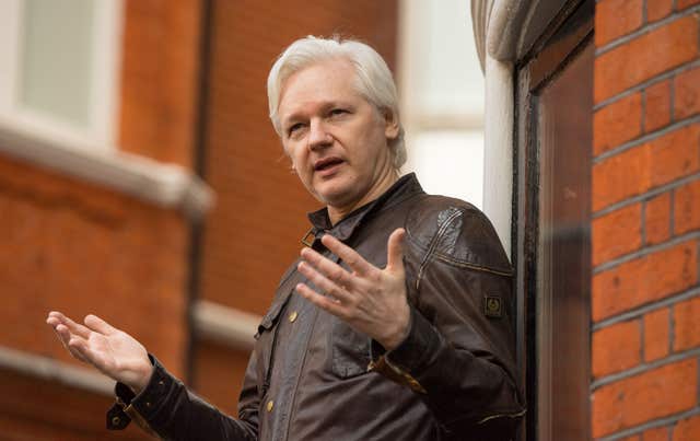 Julian Assange speaking from the balcony of the Ecuadorian embassy in London in 2017