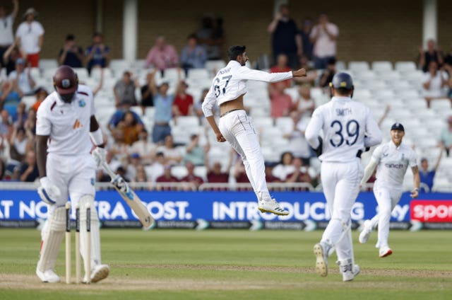 Shoaib Bashir, centre,  leaps in the air to celebrate a wicket