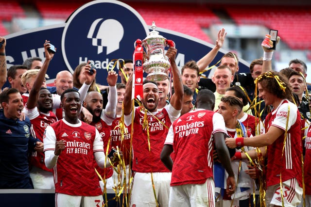 Pierre-Emerick Aubameyang scored twice to beat Chelsea before lifting the FA Cup.