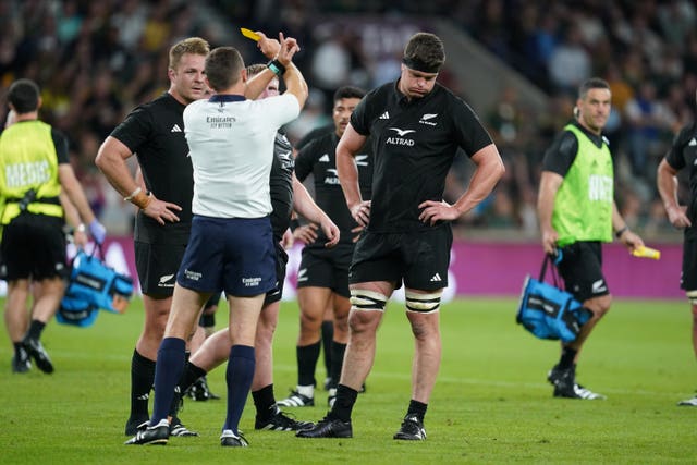 Scott Barrett (right) is shown a second yellow card