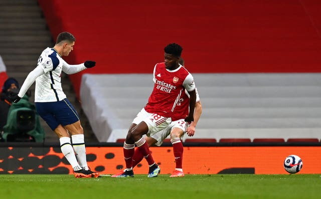 Erik Lamela (left) - later sent off - puts Tottenham 1-0 up at Arsenal with a stunning rabona finish (Dan Mullan/PA).