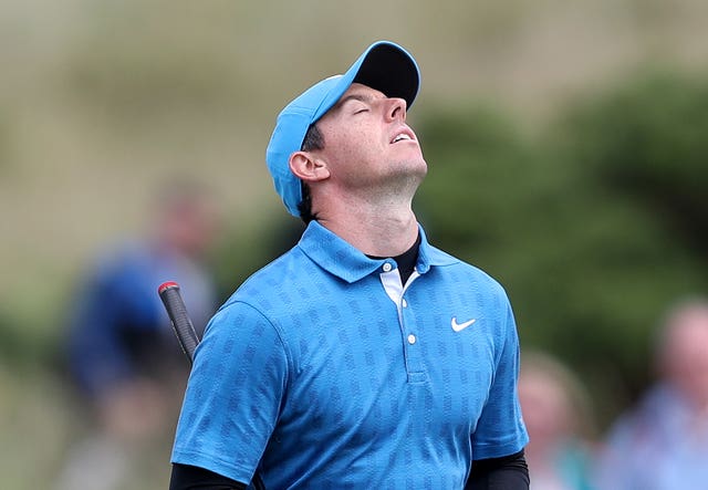 Rory McIlroy closes his eyes in frustration
