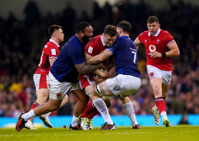 Wales’ Will Rowlands is tackled by France’s Charles Ollivon 