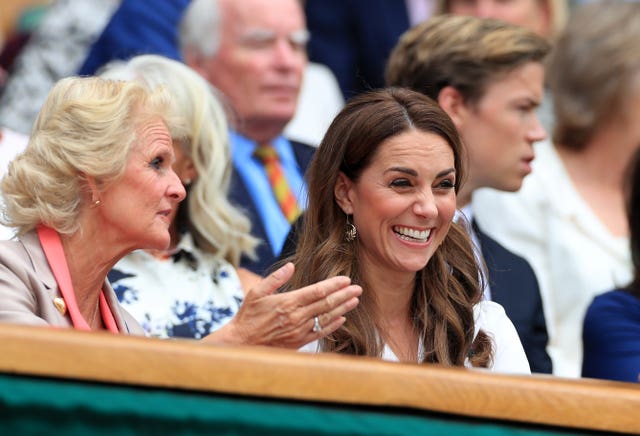 She was seen chatting to Gill Brook, the wife of Wimbledon chairman Philip Brook