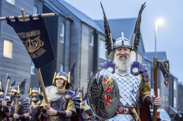 A man in a quite splendid Viking helmet