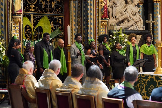 A community choir performs at the Grenfell fire memorial service at Westminster Abbey in London