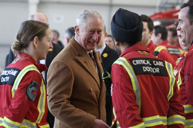 The prince speaks to medical crews (Aaron Chown/PA)