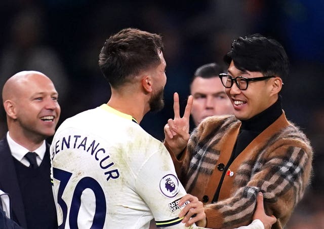 Rodrigo Bentancur and Son Heung-min embracing